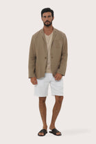 Model wearing the brown linen Tenggara blazer by By The Sea Bali