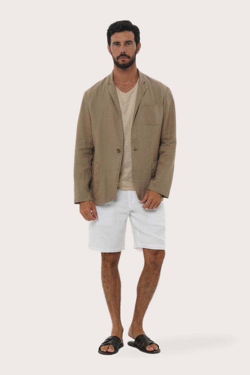 Model wearing the brown linen Tenggara blazer by By The Sea Bali