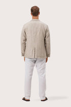 Back view of the crema linen jacket with a relaxed and contemporary silhouette