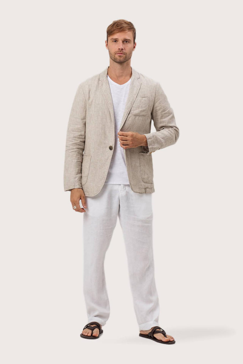 Model wearing the crema linen Tenggara jacket by By The Sea Bali