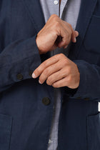 Close-up texture of the breathable linen fabric and premium craftsmanship