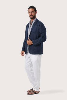 Side profile of the La Brisa linen jacket showcasing its comfortable fit and effortless drape