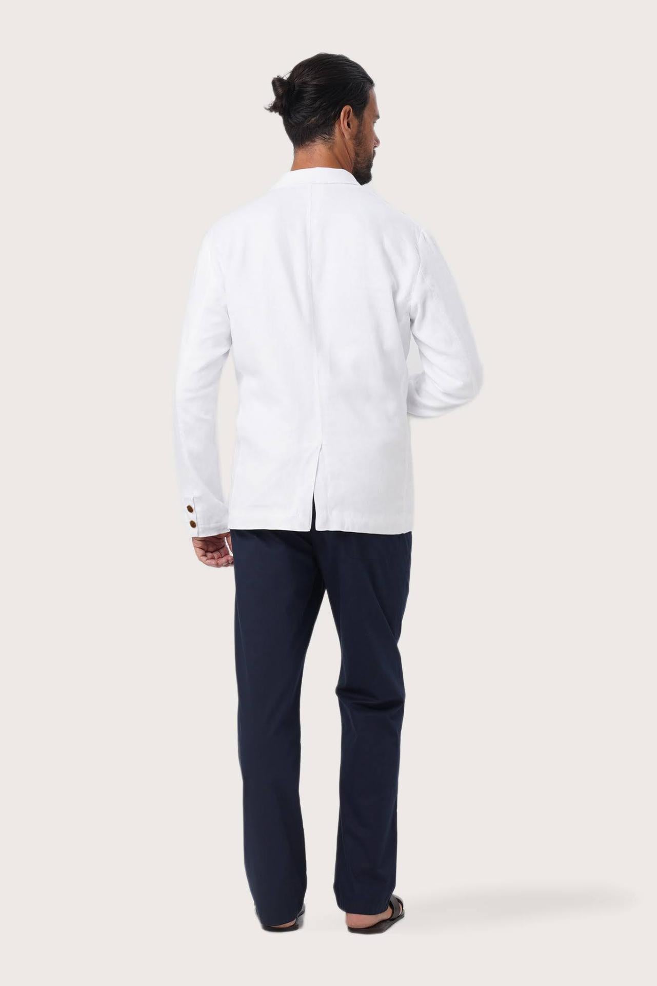 Back view of the white linen jacket with a relaxed and contemporary silhouette