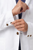 Close-up texture of the breathable linen fabric and premium craftsmanship