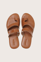 Terra sandal in marrone shown in a global view highlighting its full silhouette and refined resort design