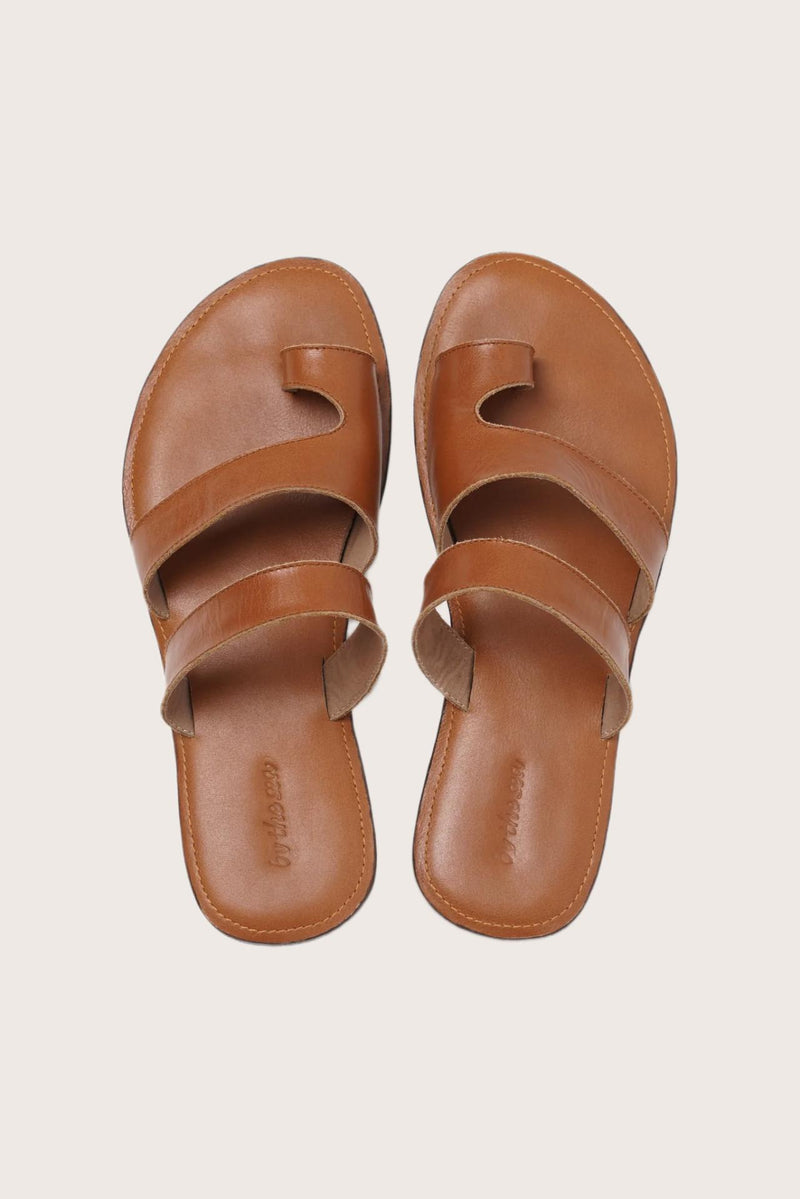 Terra sandal in marrone shown in a global view highlighting its full silhouette and refined resort design