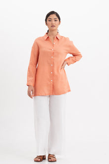 Front view of the Tifa Linen Shirt Orange showcasing its silhouette and relaxed fit.