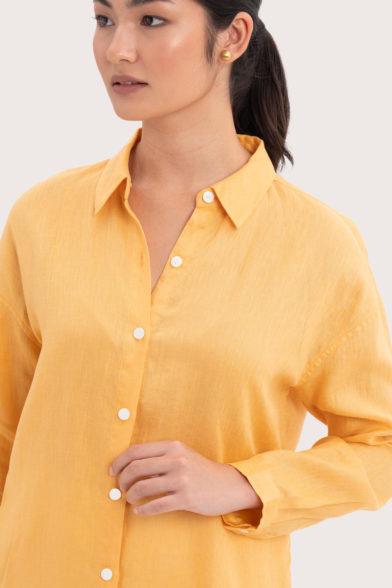 Close up detail of the Tifa Linen Shirt Yellow highlighting craftsmanship and design features.