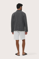Back view of the dark grey blazer with a tailored and contemporary silhouette