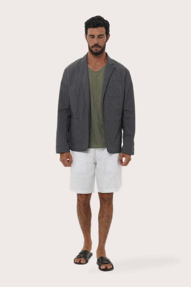 Model wearing the dark grey Varo blazer by By The Sea Bali