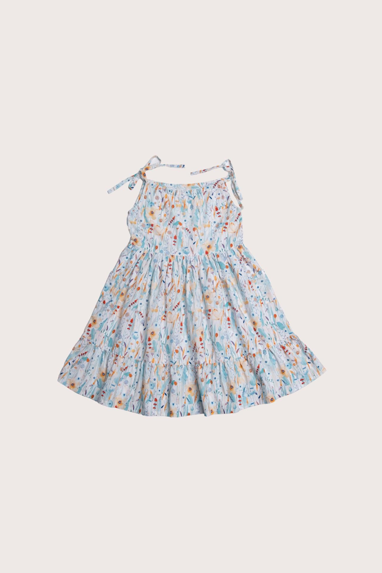 By The Sea Bali Victoria Dress in Blue Fairies print with playful resort-inspired silhouette