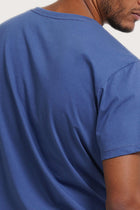 Back detail of the Watu T-shirt Aksara Bali in Indigo by By The Sea Bali – premium stitching and artisan quality