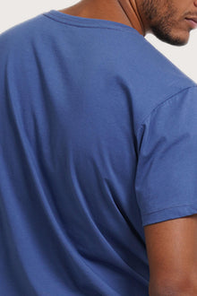 Back detail of the Watu T-shirt Aksara Bali in Indigo by By The Sea Bali – premium stitching and artisan quality