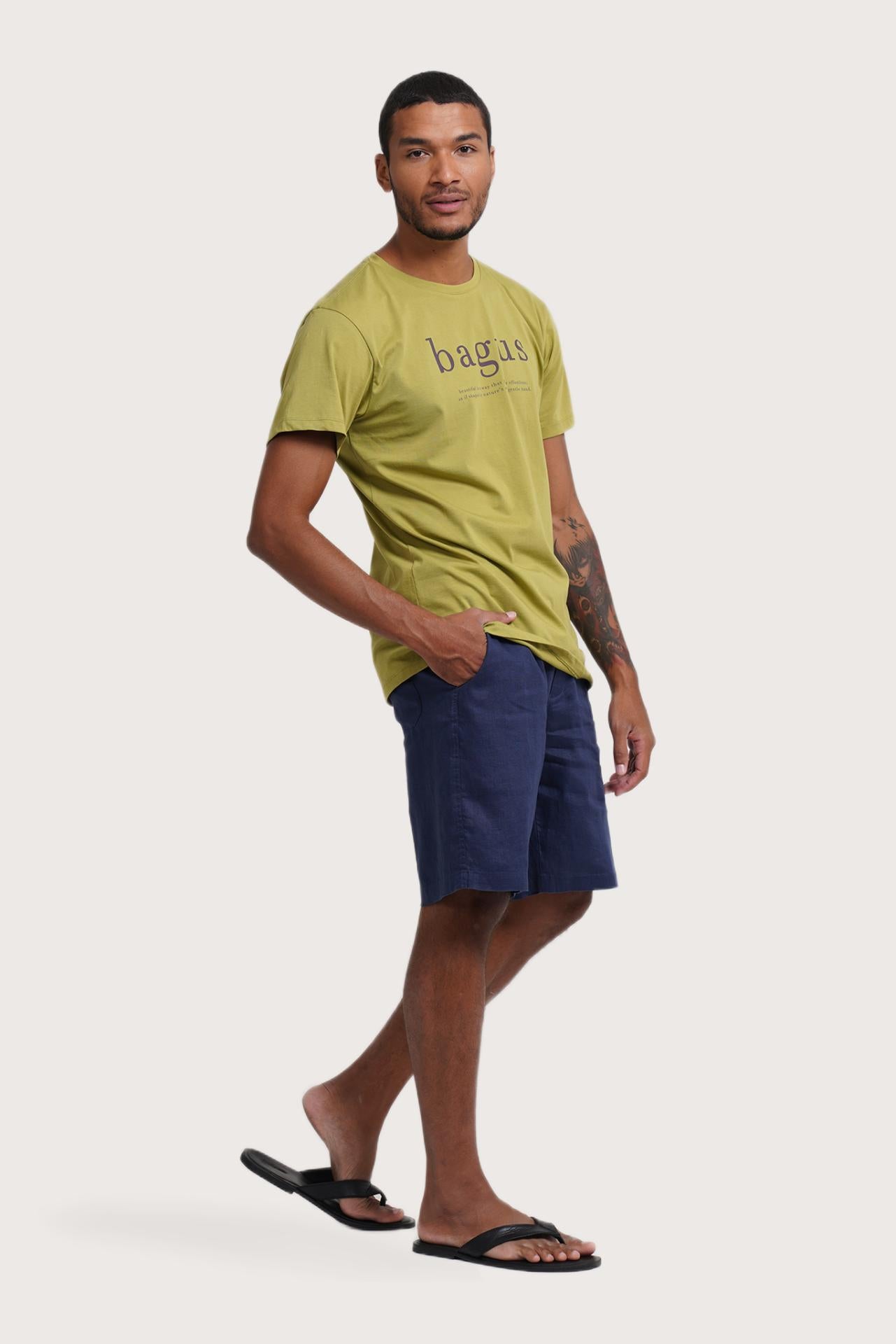 Side profile of the Watu T-shirt Bagus by By The Sea Bali – relaxed drape and understated island elegance