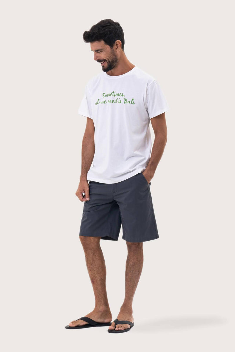 Side profile of the Watu T-shirt White by By The Sea Bali – relaxed drape and understated island elegance