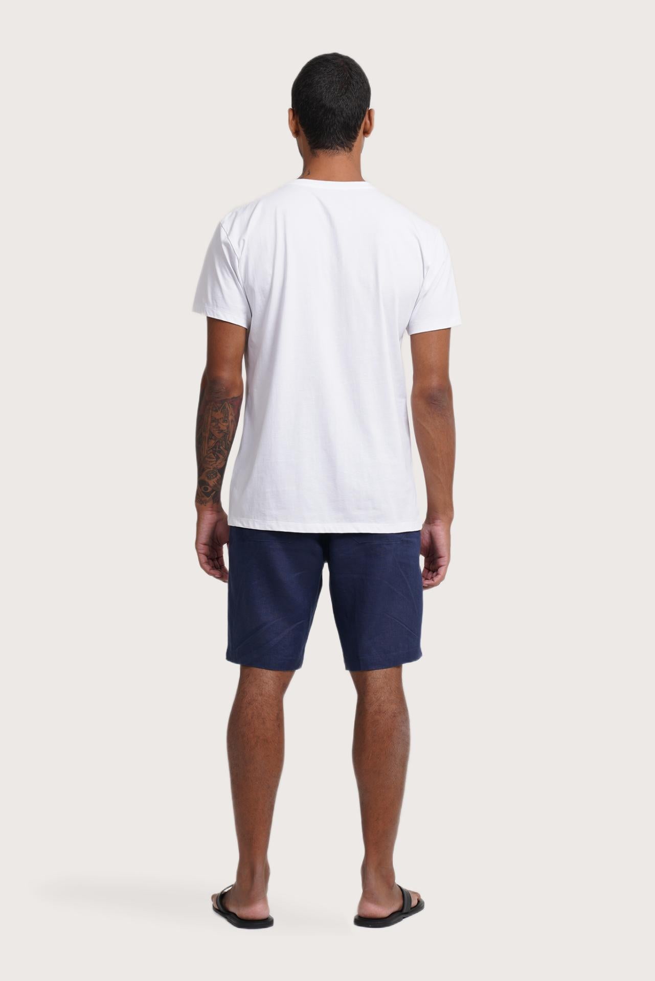 Back view of the By The Sea Bali Watu T-shirt Bali Waves – clean tailoring and refined craftsmanship