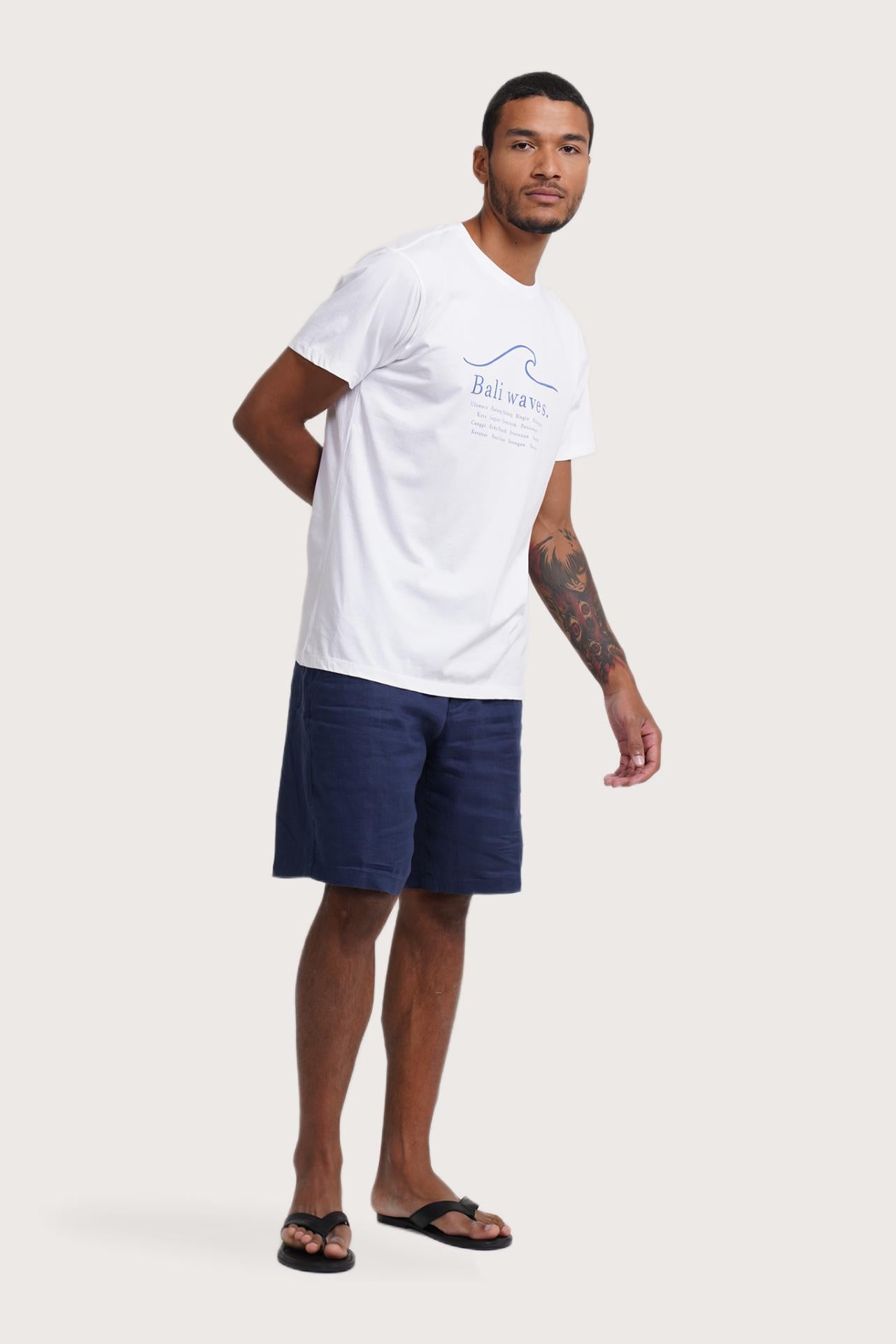 Side profile of the Watu T-shirt Bali Waves by By The Sea Bali – relaxed drape and understated island elegance