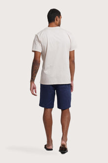 Back view of the By The Sea Bali Watu T-shirt Canggu in Cream – clean tailoring and refined craftsmanship
