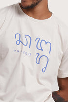 Close-up of the Watu T-shirt Canggu in Cream by By The Sea Bali – exceptional fabric quality and texture