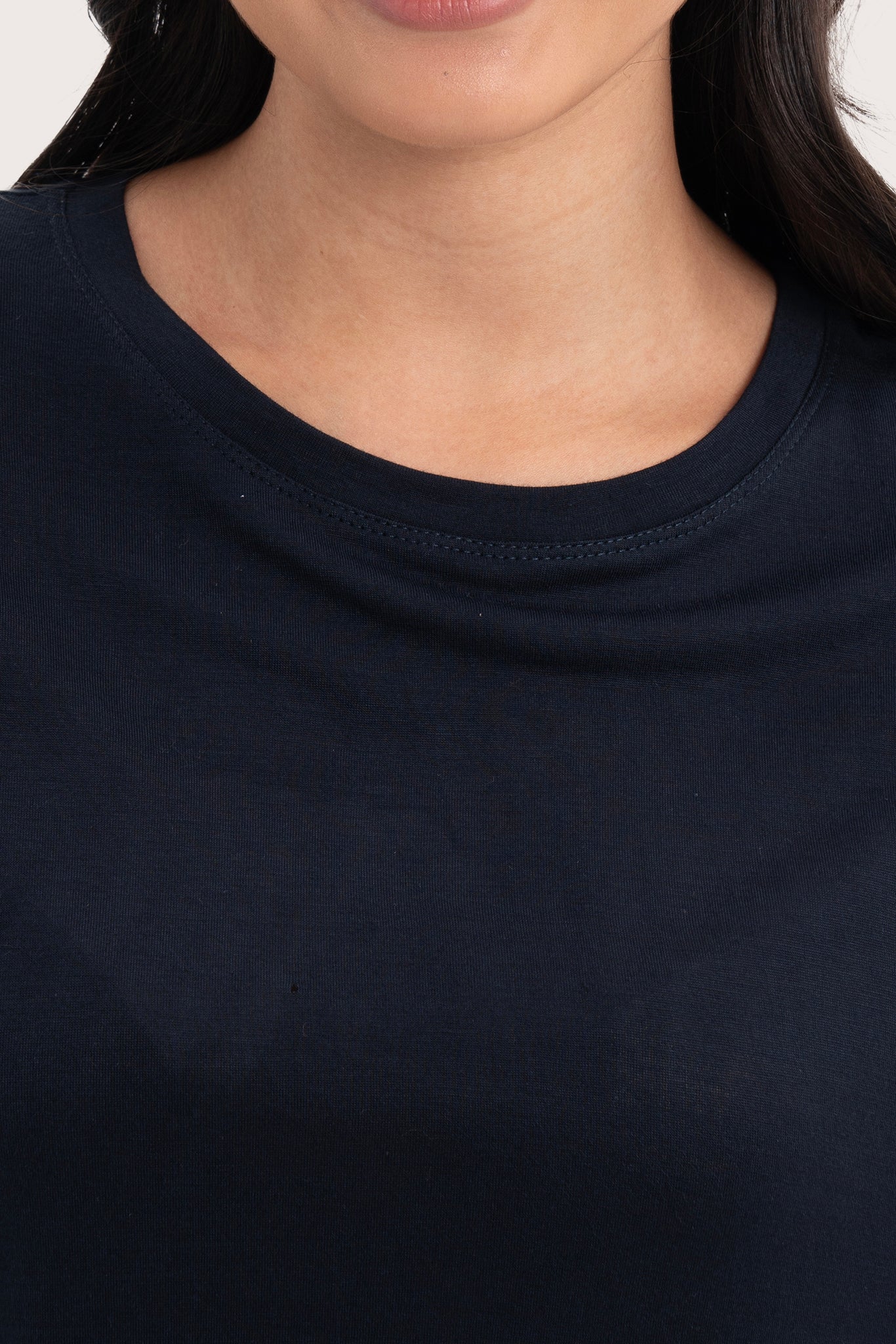Close up front  of the Yara Top Navy highlighting craftsmanship and design features.