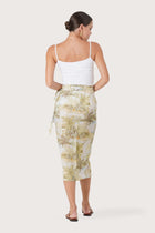 Back view of the Zaree Linen Skirt The Island highlighting the garment shape and drape