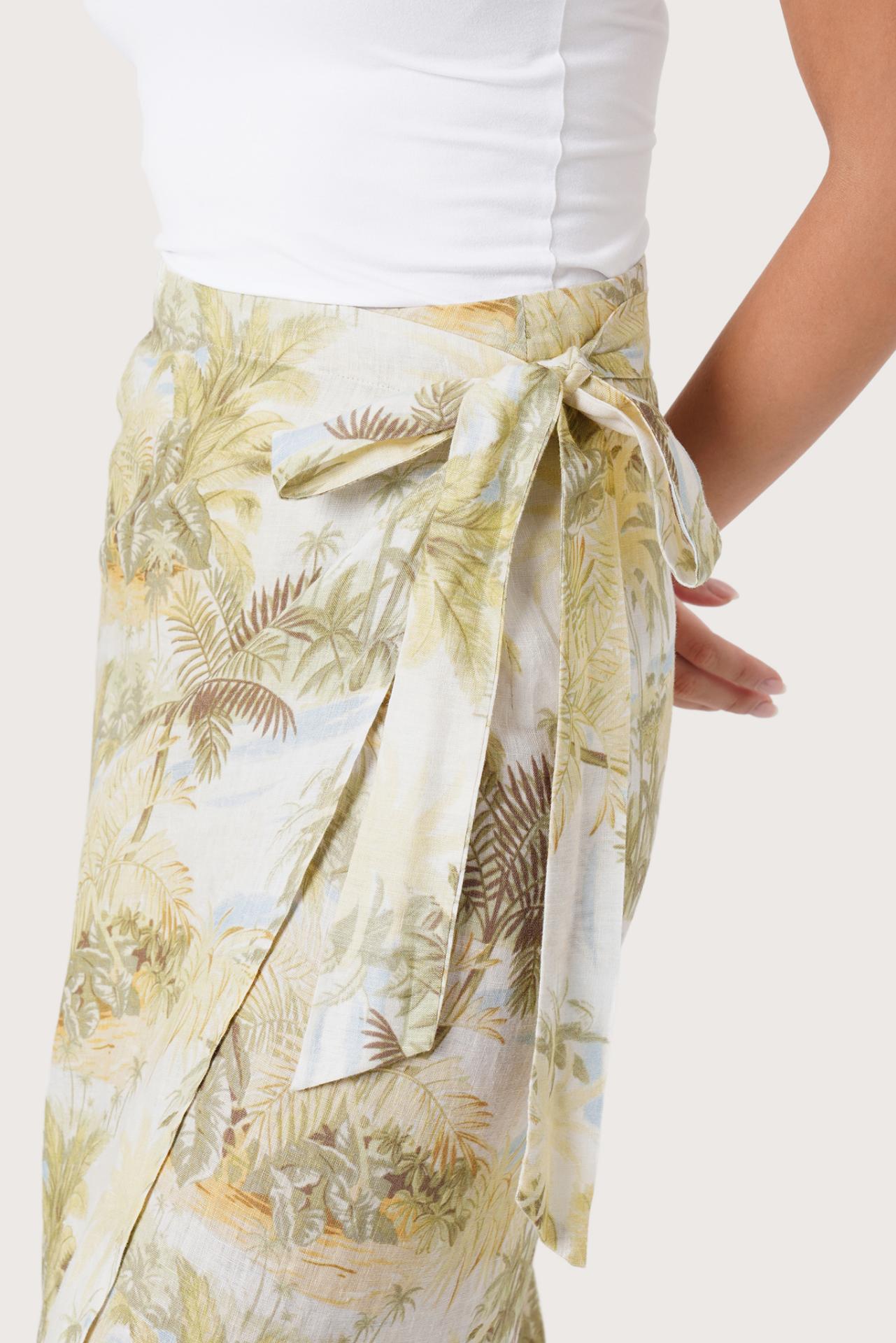 Close up detail of the Zaree Linen Skirt The Island highlighting craftsmanship and design features.