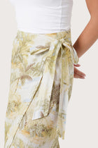 Close up detail of the Zaree Linen Skirt The Island highlighting craftsmanship and design features.