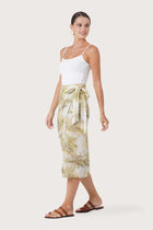 Side profile of the Zaree Linen Skirt The Island showing its cut and natural movement