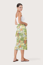 Side profile of the Zaree Linen Skirt Tropis showing its cut and natural movement