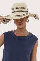 By The Sea Bali Zelda hat in natural woven straw, featuring a refined wide-brim silhouette designed for a resort-inspired look.
