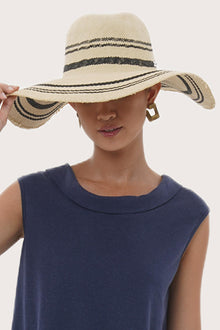 By The Sea Bali Zelda hat in natural woven straw, featuring a refined wide-brim silhouette designed for a resort-inspired look.