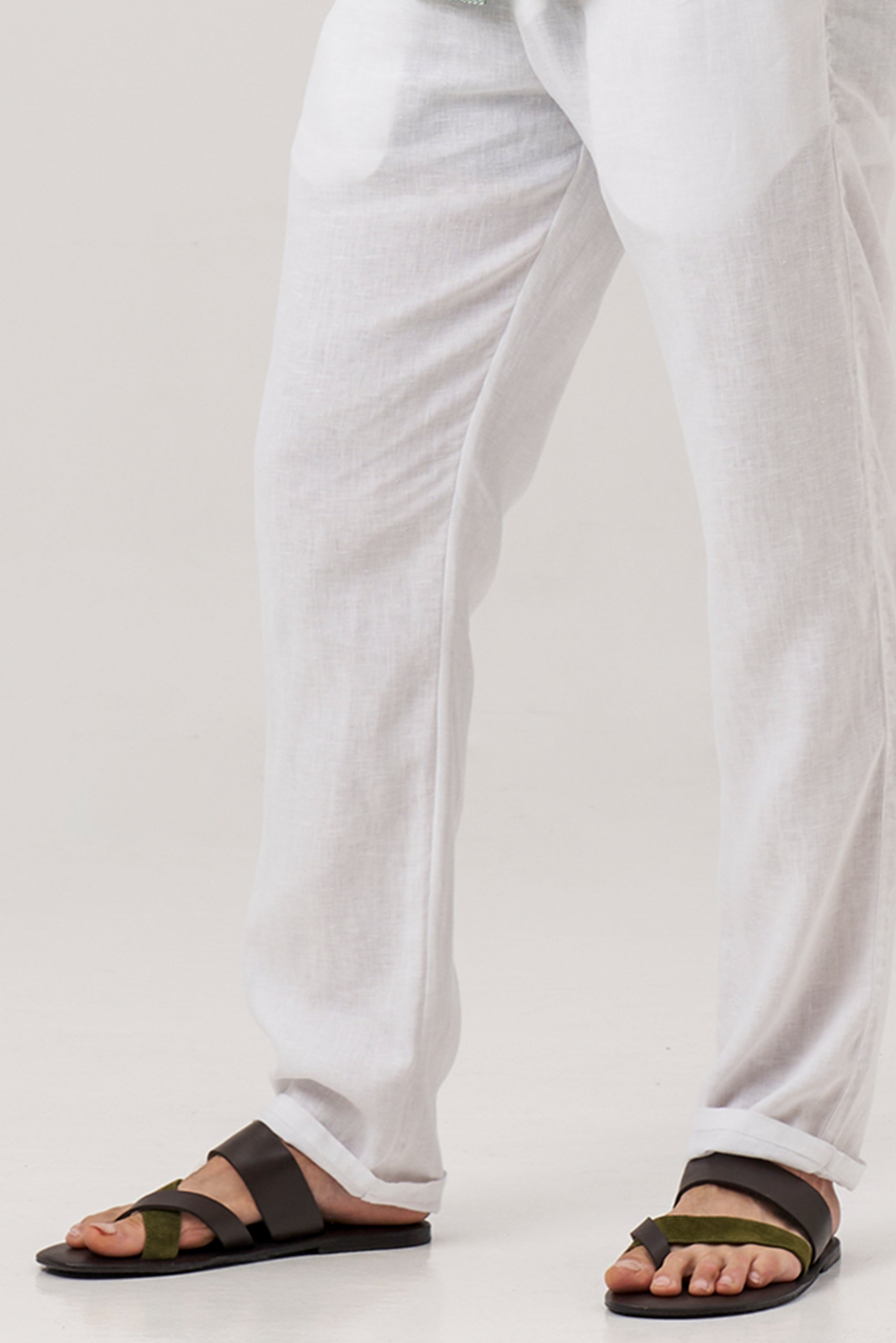 Coal sandal in brun front view showcasing elegant straps and minimalist resort aesthetic