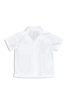 Back view of Luca Shirt White showcasing relaxed tailoring and timeless elegance